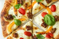 Zesty Italian Sausage Pizza with Garden Freshness