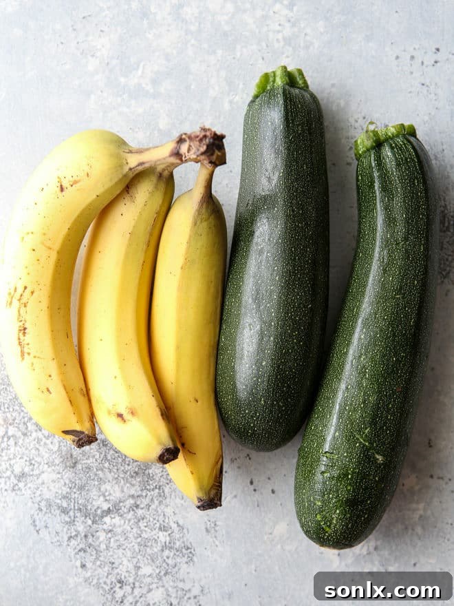 Bananas and zucchini combined, ready to be incorporated into the quick bread batter for extra moisture and flavor