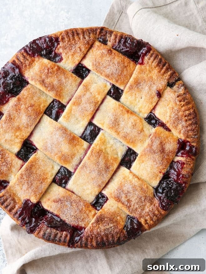 A beautifully golden-brown, flaky pie crust, ready to be filled with your favorite ingredients.
