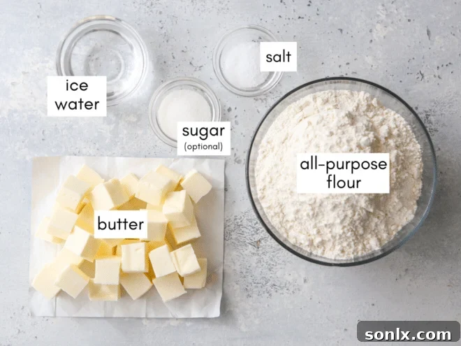 Precisely measured pie crust ingredients laid out, including flour, cold butter cubes, salt, and a small bowl of sugar.