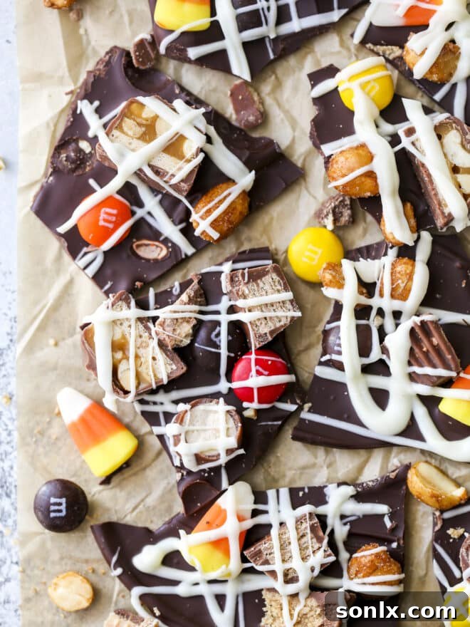 A close-up shot of colorful Halloween candy bark, snapped into perfect, shareable pieces