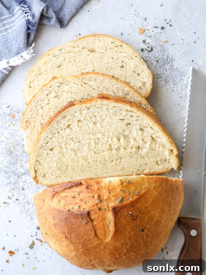 Bake this easy herb bread loaf in your dutch oven for a crispy crust!