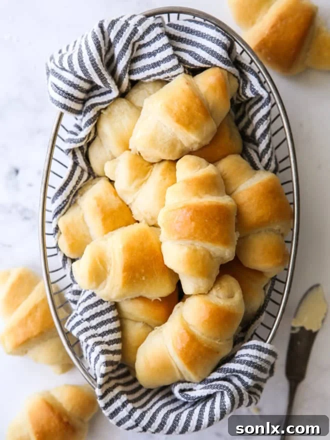 easy no-knead fairy crescent rolls in a bread basket