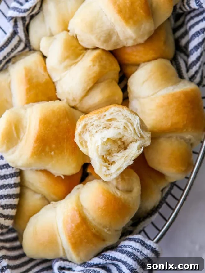 inside of easy no-knead fairy crescent rolls in a bread basket