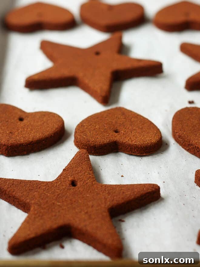 Baked homemade cinnamon ornaments ready for stringing