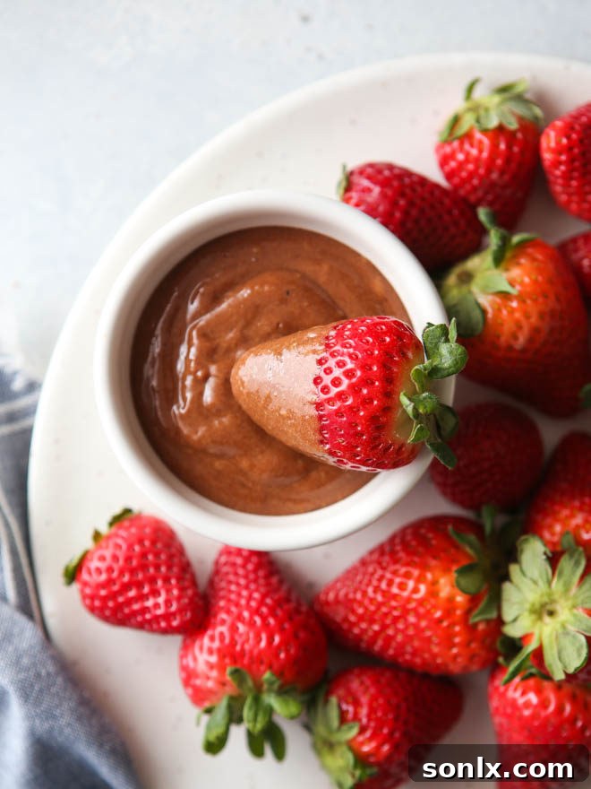 A close-up of the creamy, rich chocolate zabaglione, highlighting its smooth texture and deep color.