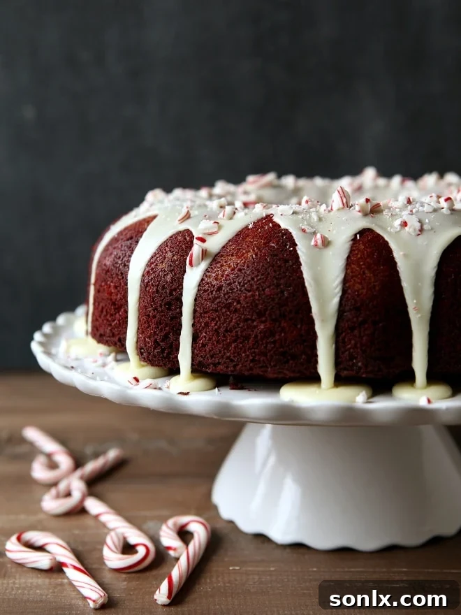 Festive Cheesecake Stuffed Peppermint Red Velvet Bundt Cake with White Chocolate Glaze