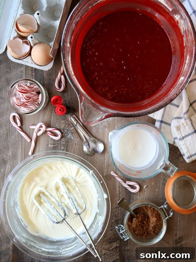 Slice of Peppermint Red Velvet Bundt Cake revealing creamy cheesecake filling