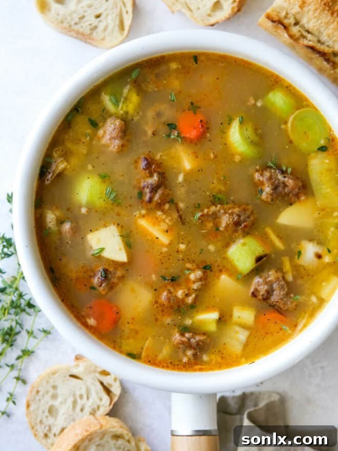 close-up of potato leek and italian sausage soup in a pot