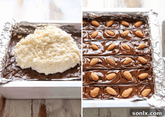 The smooth, creamy coconut filling being spread evenly over the chocolate fudge base.
