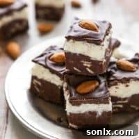 A top-down view of the finished Coconut Almond Fudge, perfectly cut into squares.