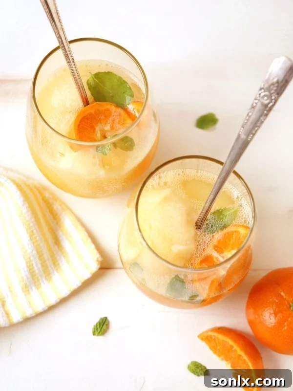 Tangerine Sorbet Champagne Floats - elegant celebratory dessert idea