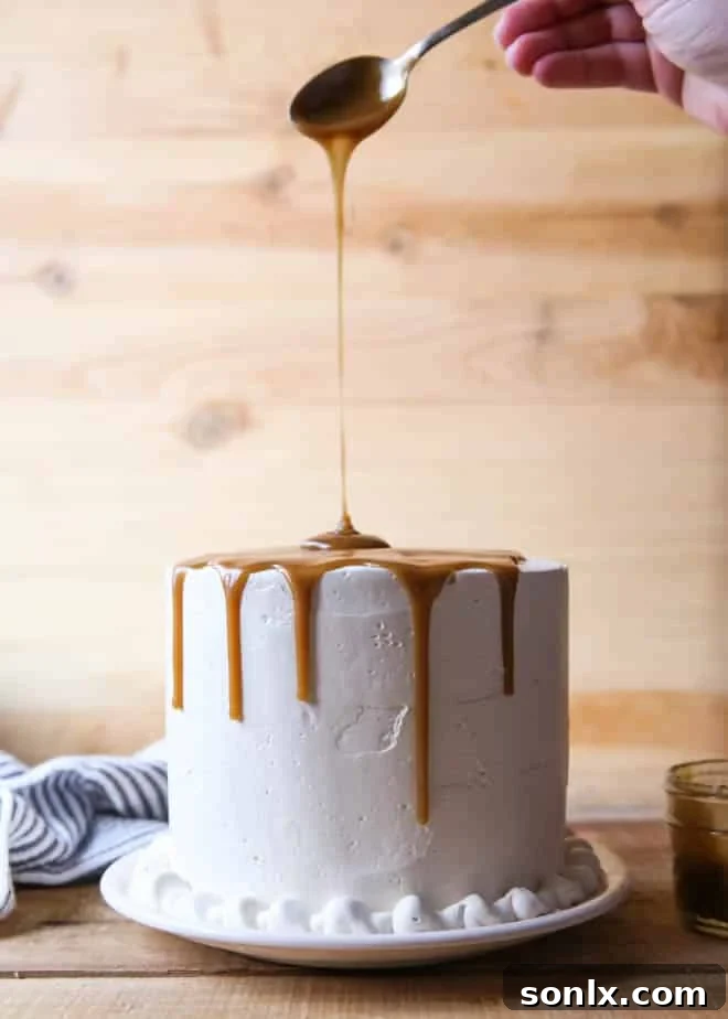 An overhead shot of a single slice of Bourbon Butterscotch Cake.