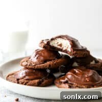 pile of chocolate marshmallow cookies on a plate