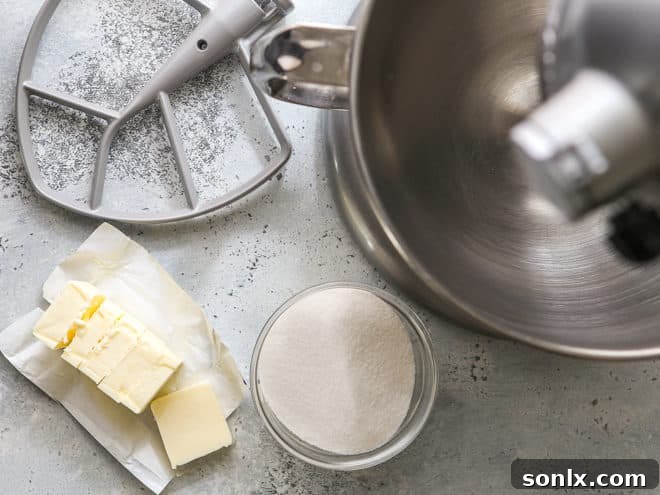 Butter, sugar, and an electric stand mixer