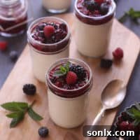 Featured image for Vanilla Bean Panna Cotta with Roasted Berries recipe