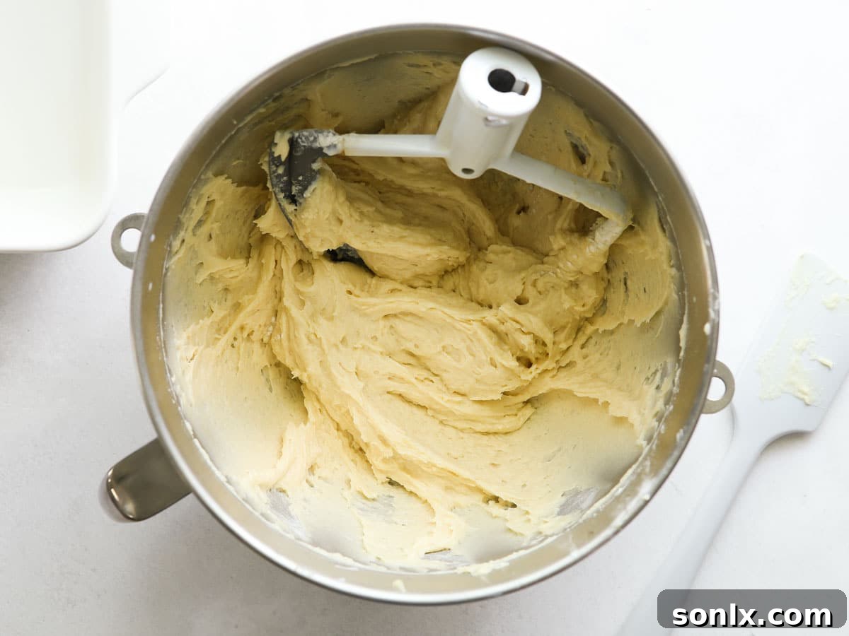 Vanilla buttermilk cake batter in a mixing bowl before baking