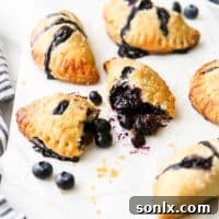 closeup of blueberry pie filling inside hand pie