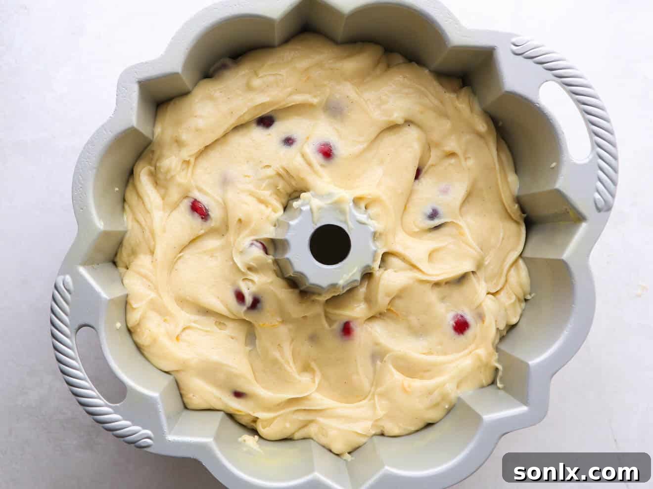 pound cake batter in bundt cake pan ready for baking