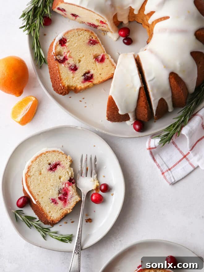 slice of bundt cake on a plate with bites taken, showing moist interior