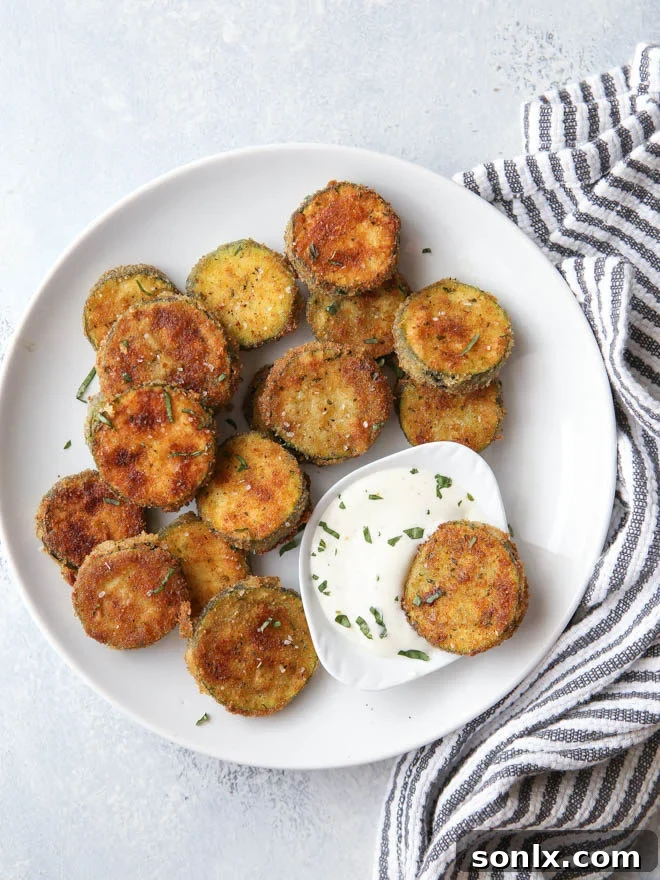Crispy pan-fried zucchini chips for a healthy side dish or snack