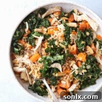 This farro bowl with chicken, kale and sweet potatoes is one of my favorite healthy meals!
