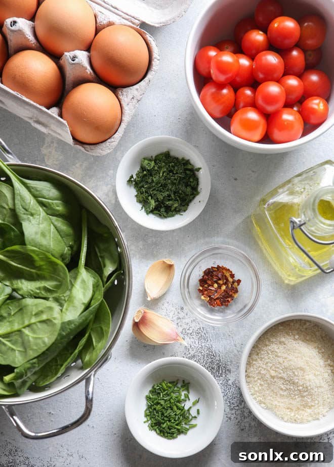 Simple, fresh ingredients for making wholesome spinach and tomato baked egg cups
