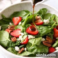 Strawberry spinach salad with warm brown butter dressing