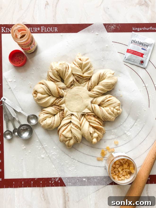 Baking session featuring Red Star Yeast, with hands working on dough.