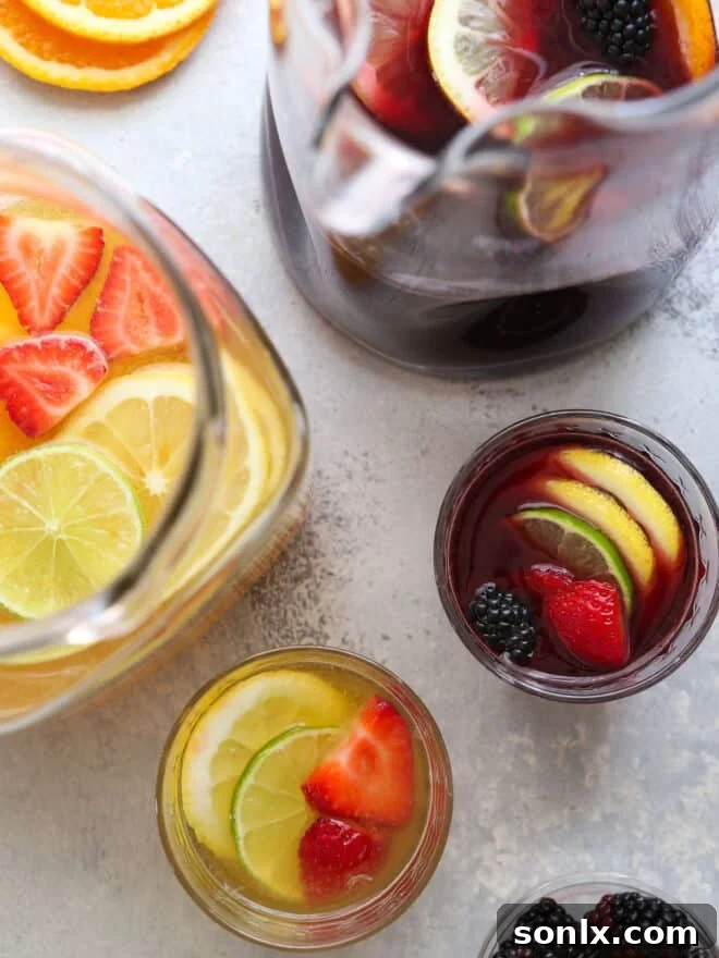 red wine sangria and white wine sangria in pitchers and glasses