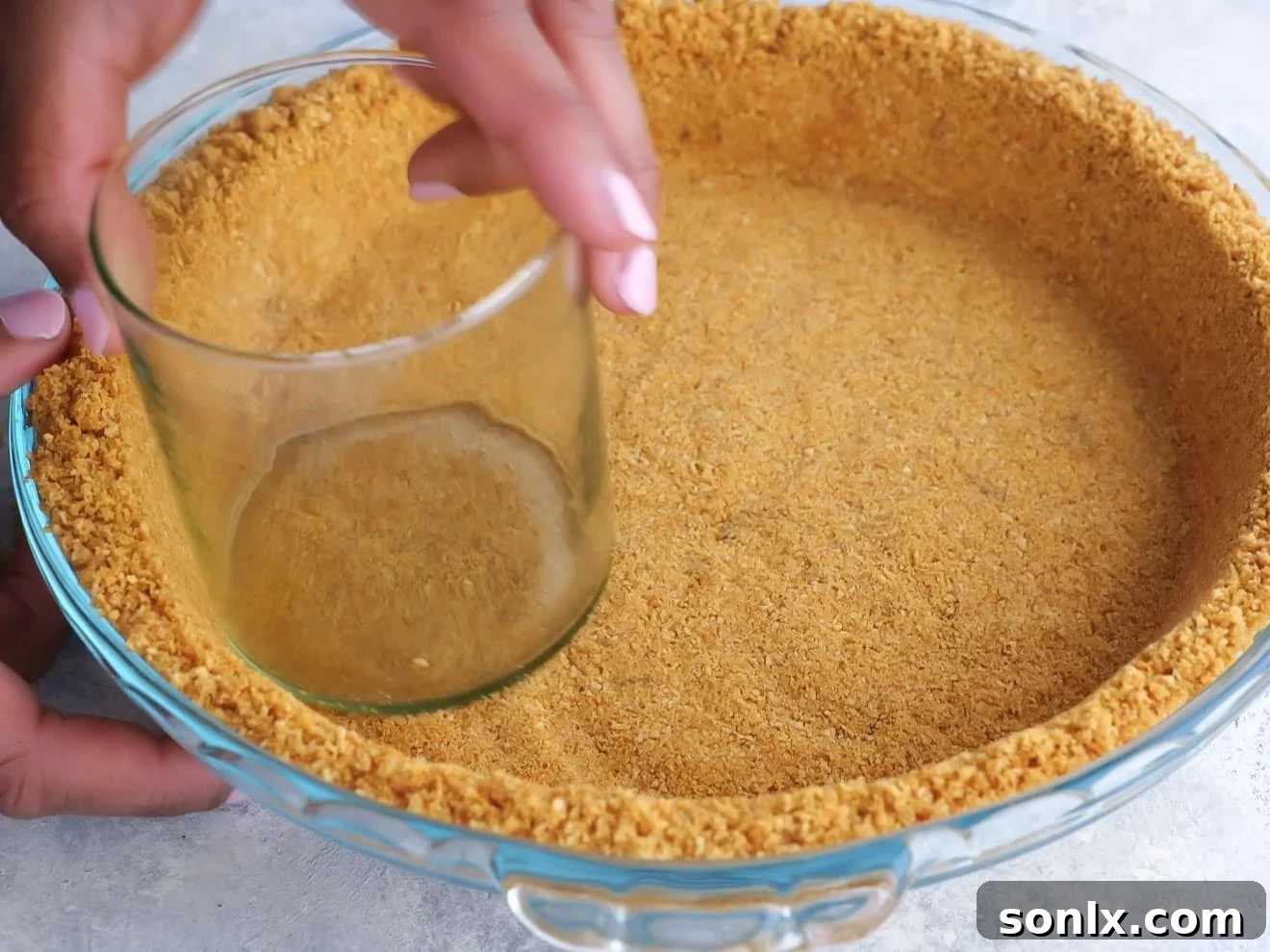 Toasted Marshmallow Ice Cream Pie 5 graham cracker crust going into pie pan