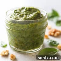 Basil walnut pesto is a great addition to meat, veggies, salads, pastas and more!