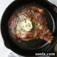 Grilled ribeye steaks with cowboy butter