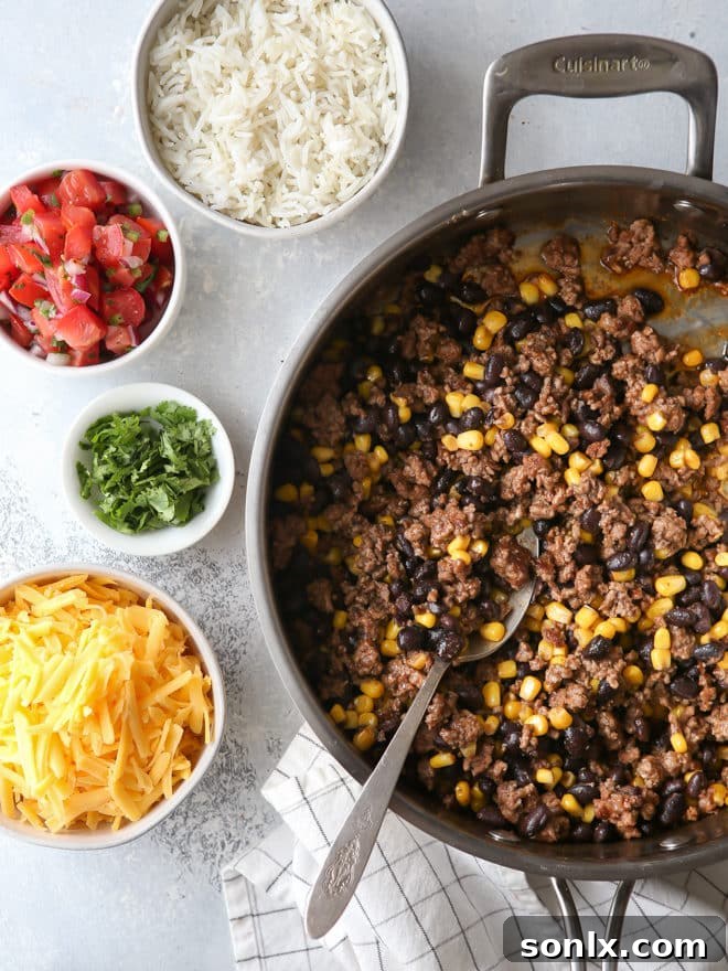 Making ground beef, black bean, and corn burritos