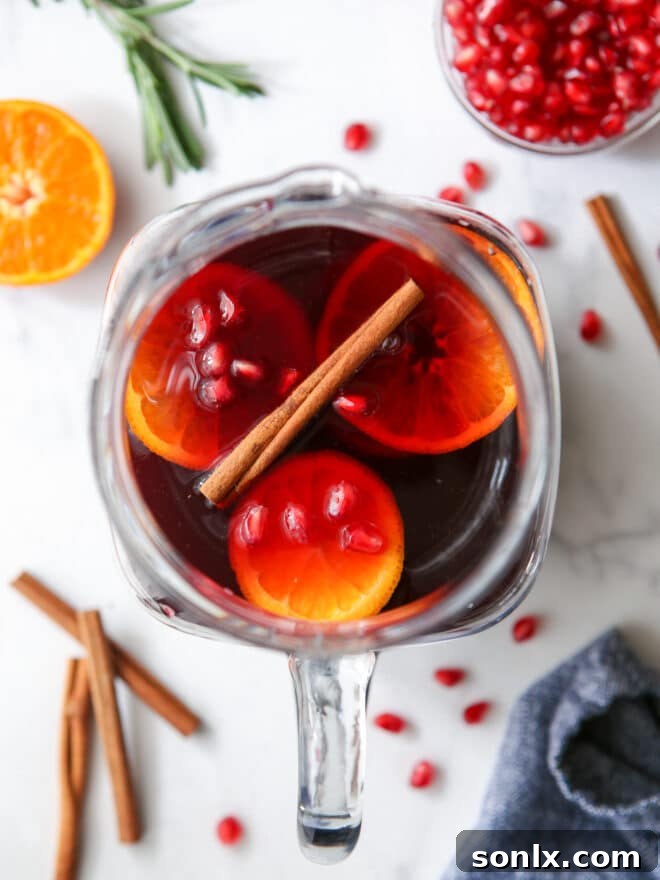 pitcher of pomegranate citrus sangria