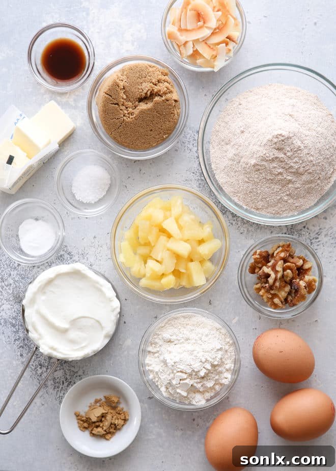 Close-up of ingredients used for making pineapple coconut bread including flour, sugar, and fruits.