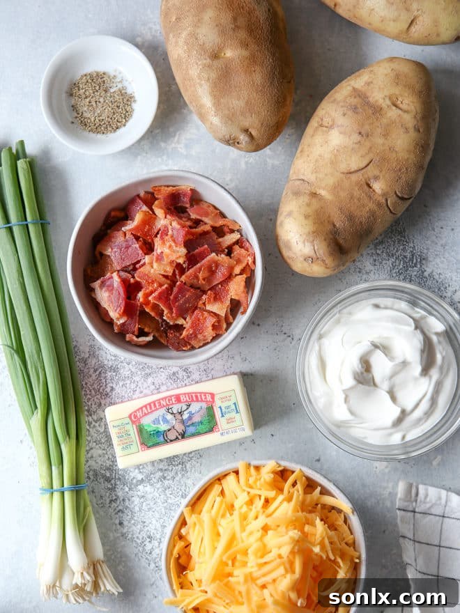 Ingredients for loaded baked potato bites laid out on a surface