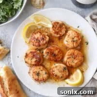 Pan-Seared Scallops with Lemon Butter Sauce, a quick and elegant dish.