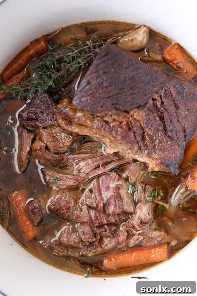 Pot roast cooked in the slow cooker is so tender and full of flavor