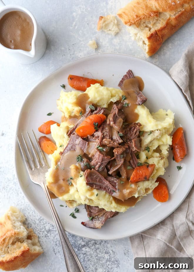 This classic pot roast recipe cooked in the slow cooker is fall-apart tender and full of so much flavor.