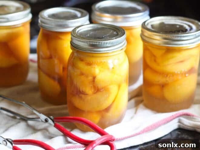 canned peaches in jars