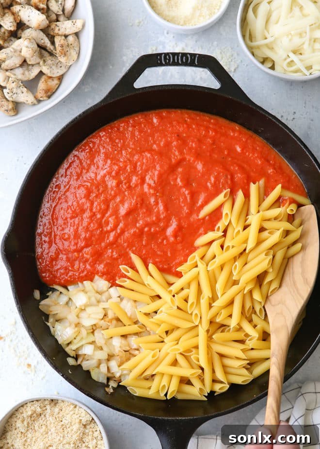 Golden Chicken Parmesan Pasta Skillet 4 One pot chicken parmesan pasta
