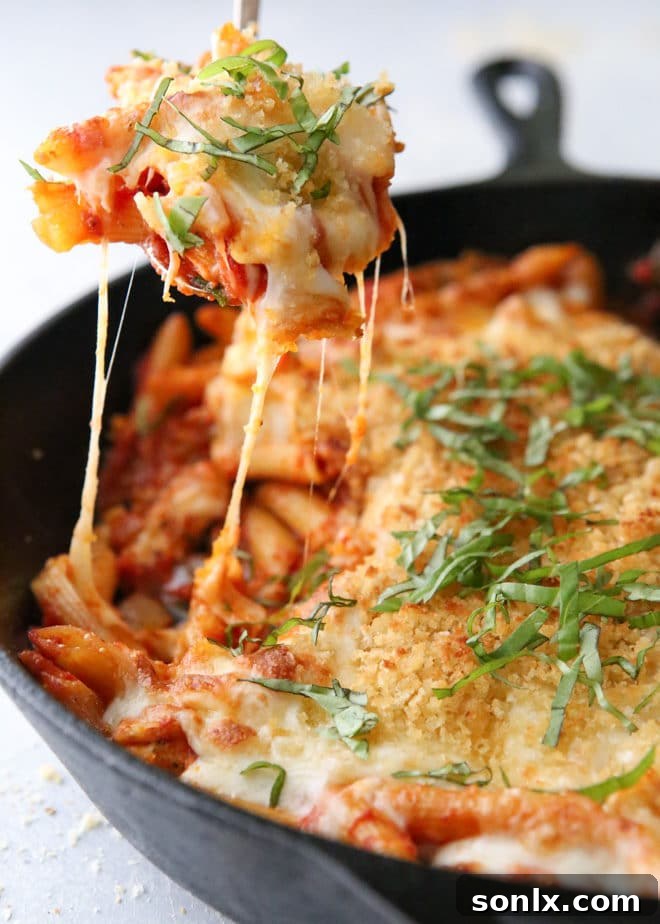 Golden Chicken Parmesan Pasta Skillet 6 This chicken parmesan pasta skillet has all the flavors of the classic favorite in an easy one-pot meal!