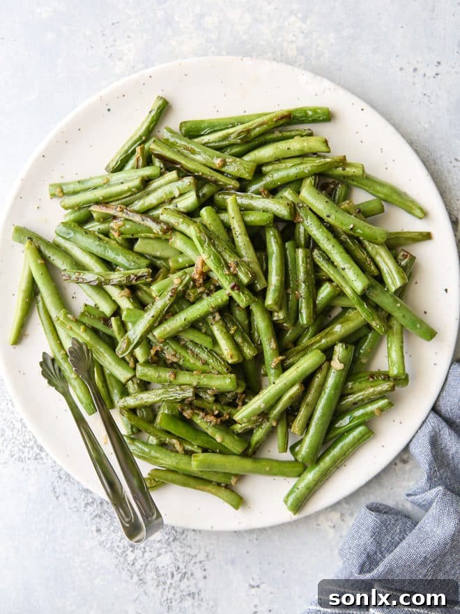 Perfectly cooked buttery garlic green beans, a simple and flavorful side dish.