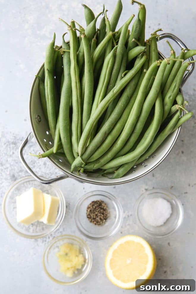 A close-up of a pan of fresh green beans, highlighting their vibrant color before cooking.
