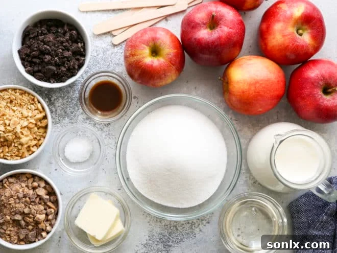 A vibrant display of fresh ingredients for homemade caramel apples, including crisp green apples, butter, sugar, and cream.
