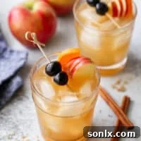 apple cider old fashioned in a glass