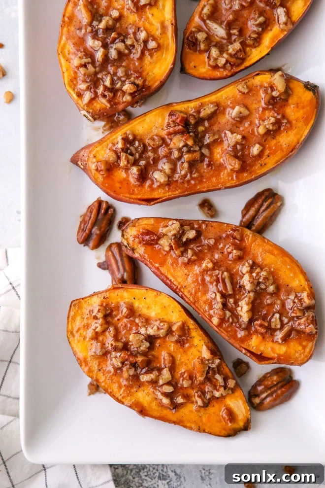 Delicious roasted sweet potatoes with maple pecan sauce, a perfect sweet and savory side dish for any meal.