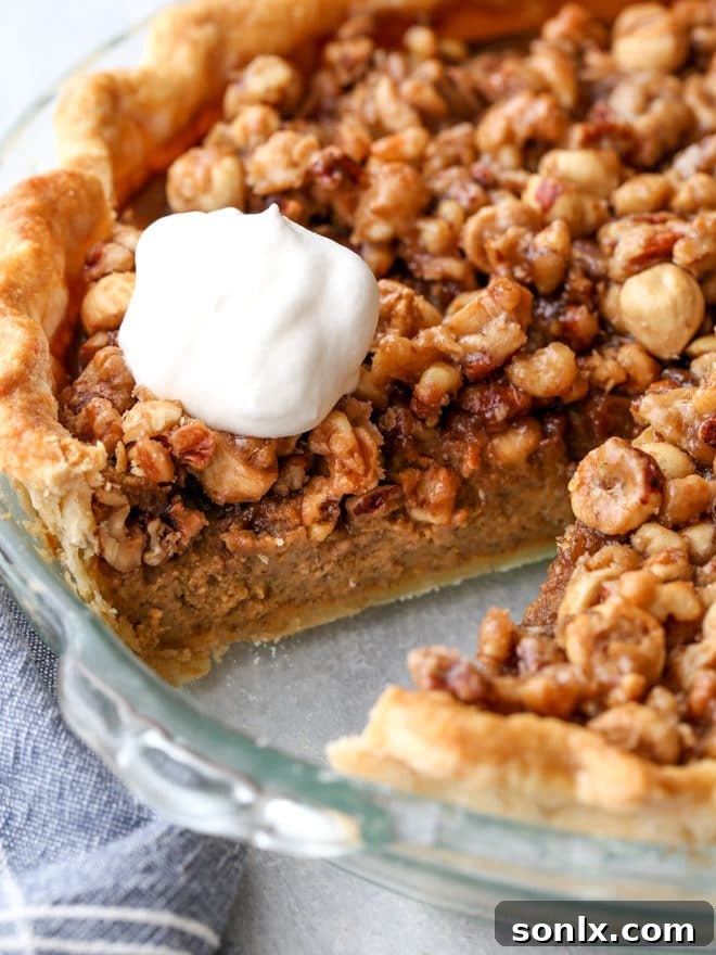 Pumpkin pie with nut praline is a delicious twist on the classic that's perfect for your holiday table!