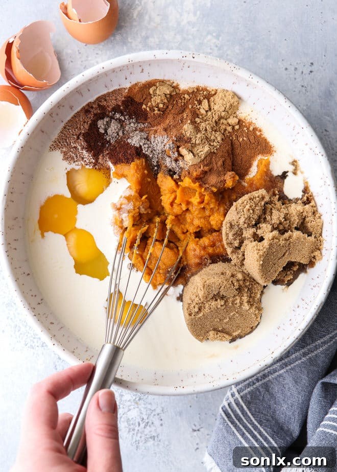 Mixing up pumpkin pie filling